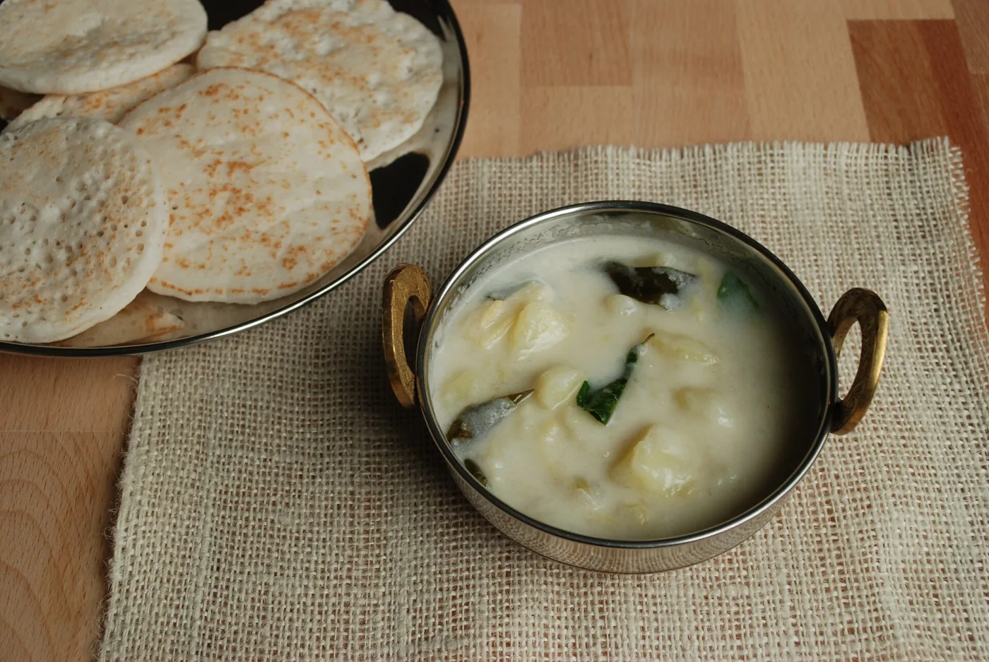 Potato ishtu — mild coconut stew with curry leaves.