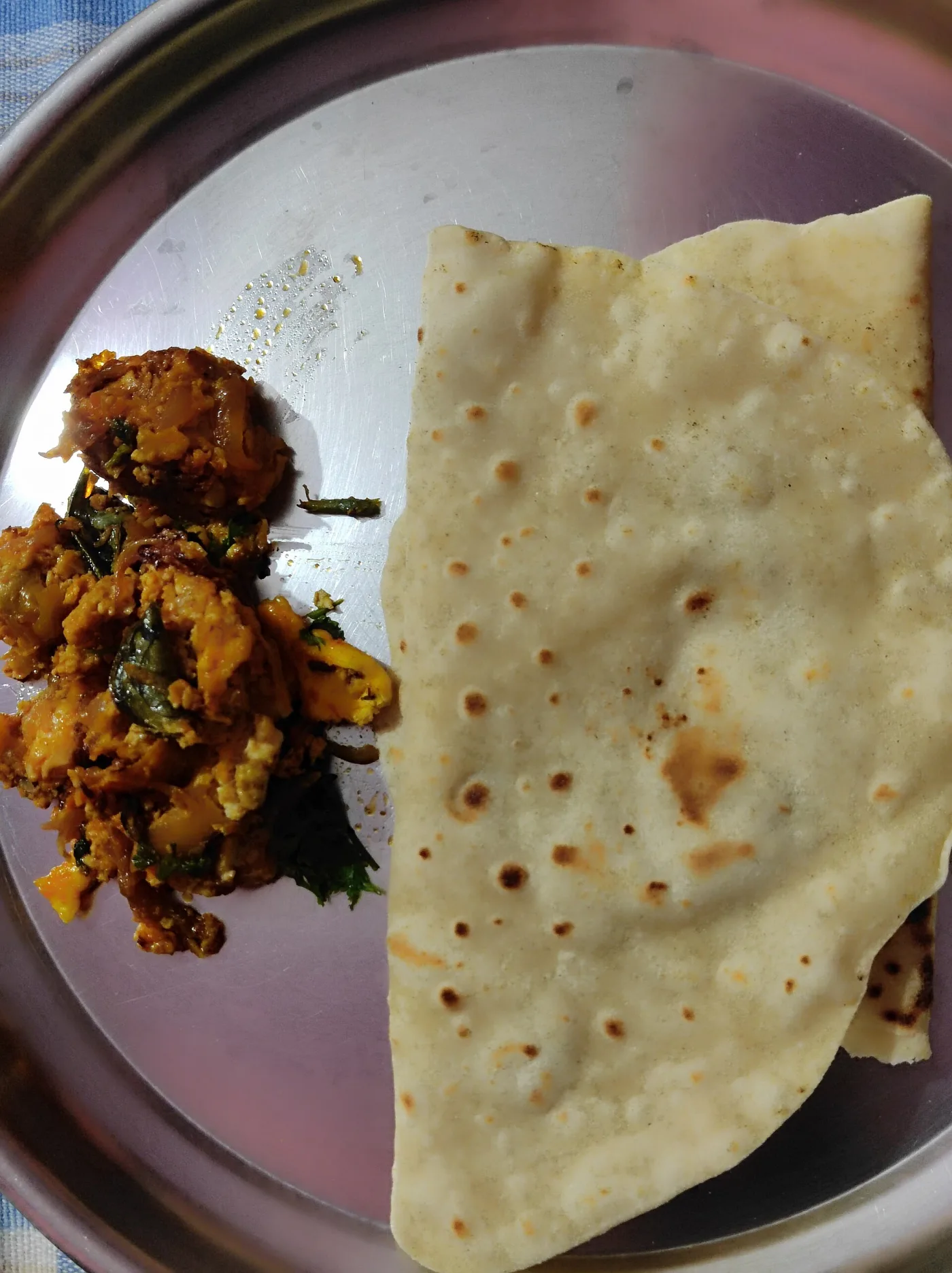 Homemade chapathi with egg curry.