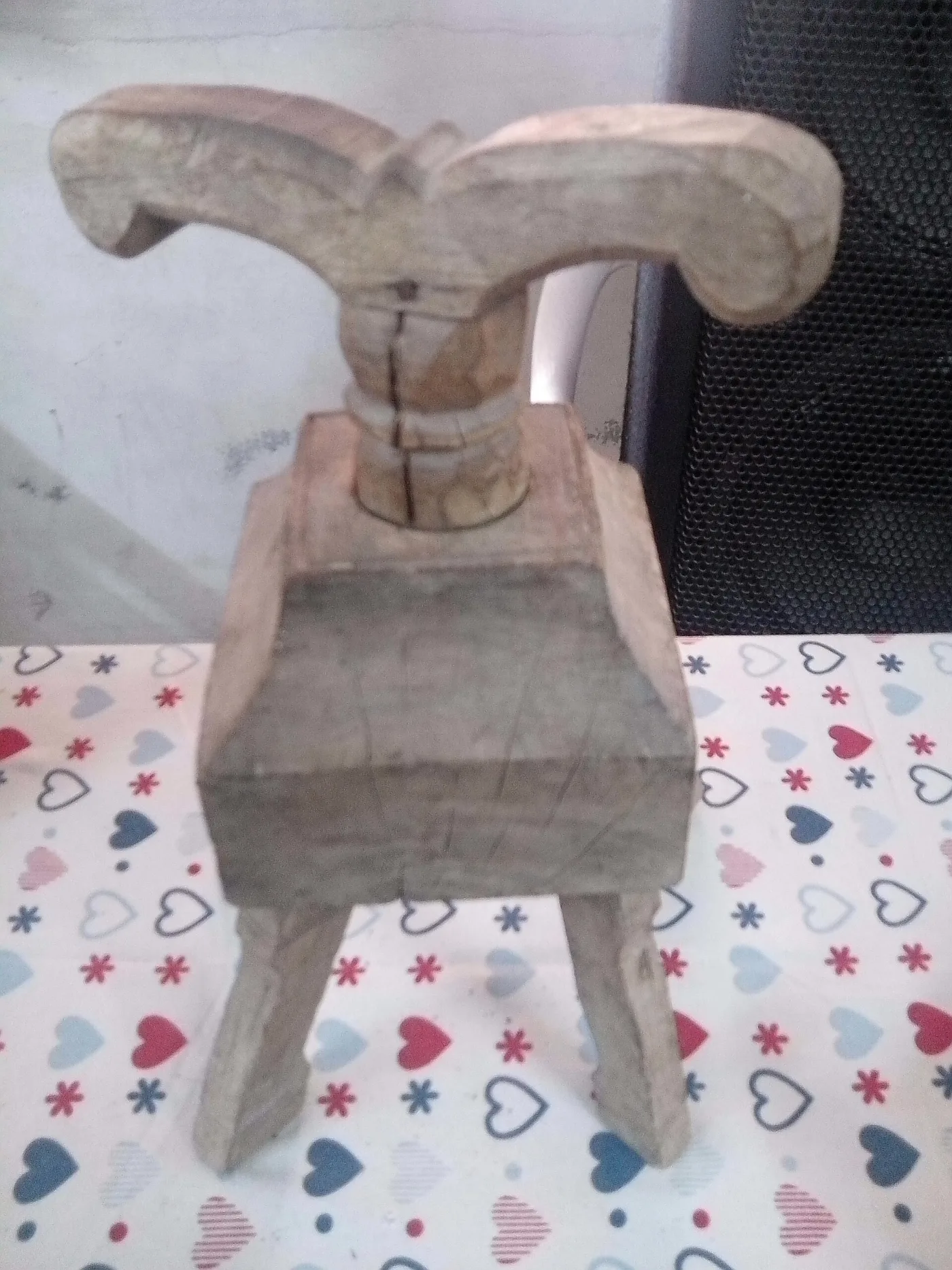 A wooden idiyappam press.