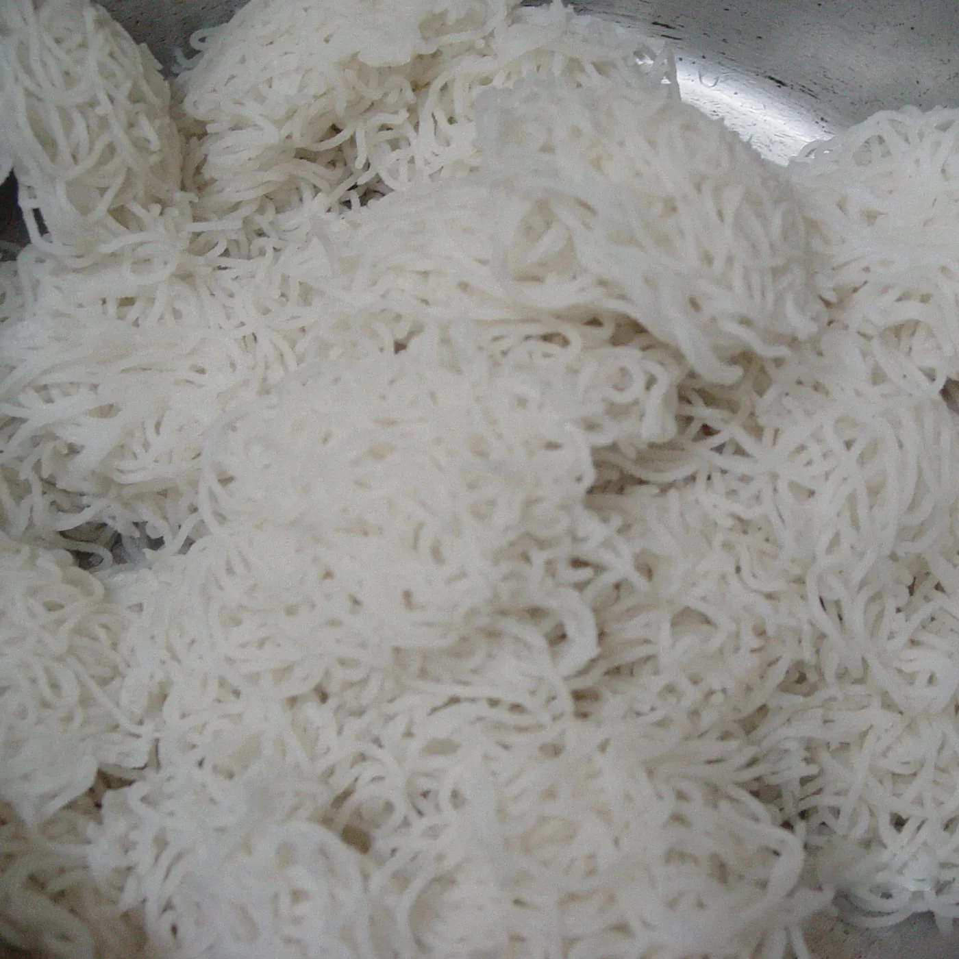 Steamed noolputtu, ready to serve.