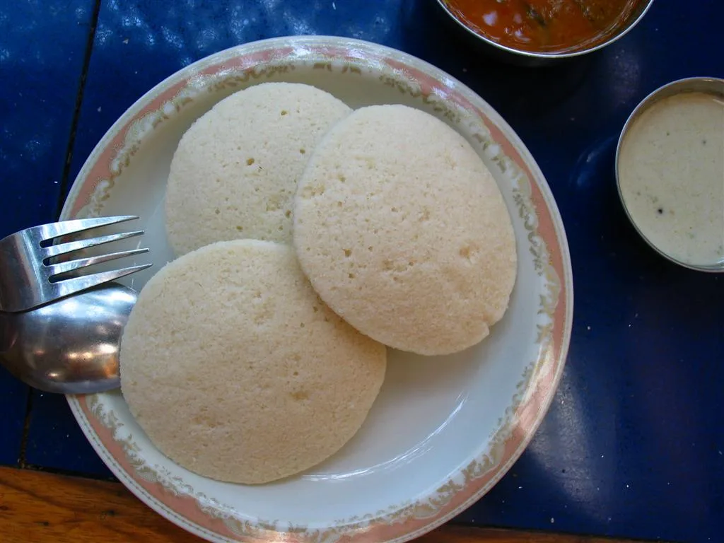 Idli with coconut chutney and sambar.