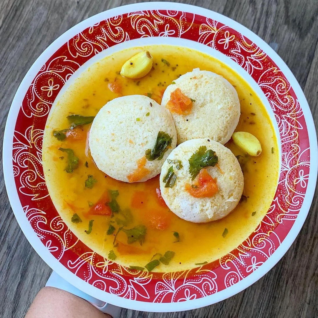 Idli served in rasam.