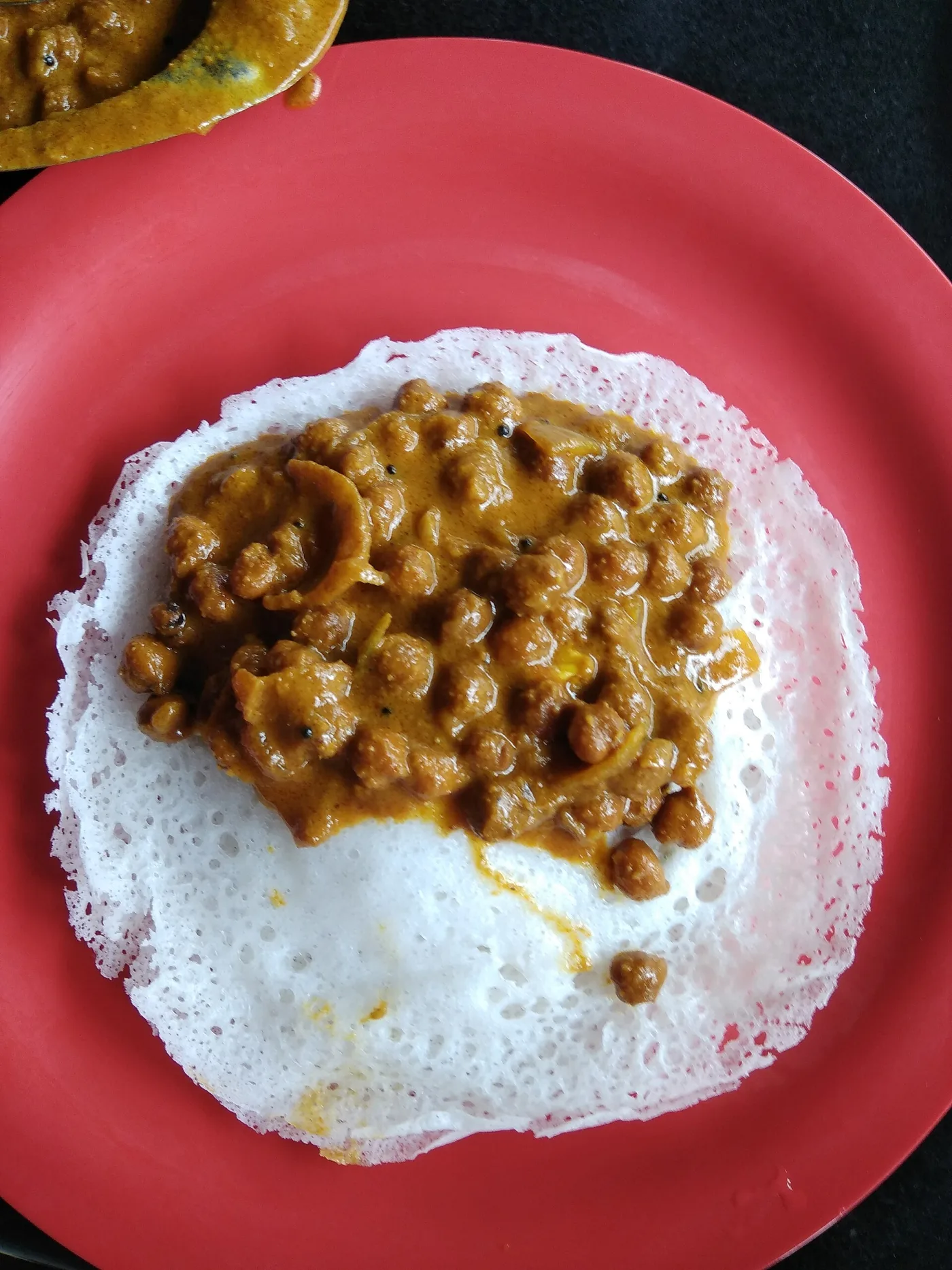 Appam with kadala curry.