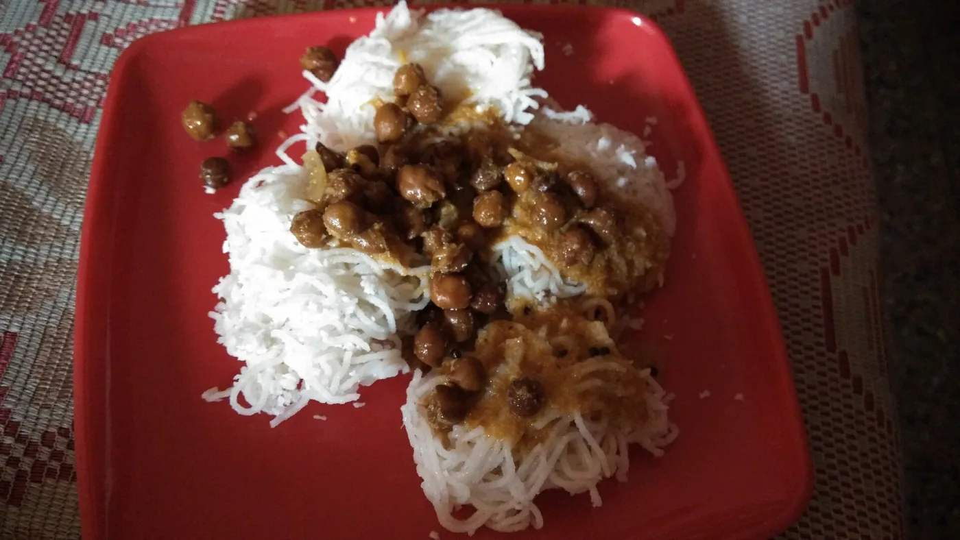 Idiyappam with kadala (chickpea) curry.